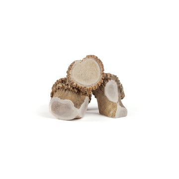 three jumbo elk medallions in a pile on a white background