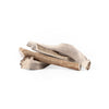 four jumbo split and quarter split elk antler chews in a pile on a white background