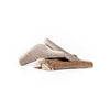 four medium split and quarter split elk antlers in a pile on a white background