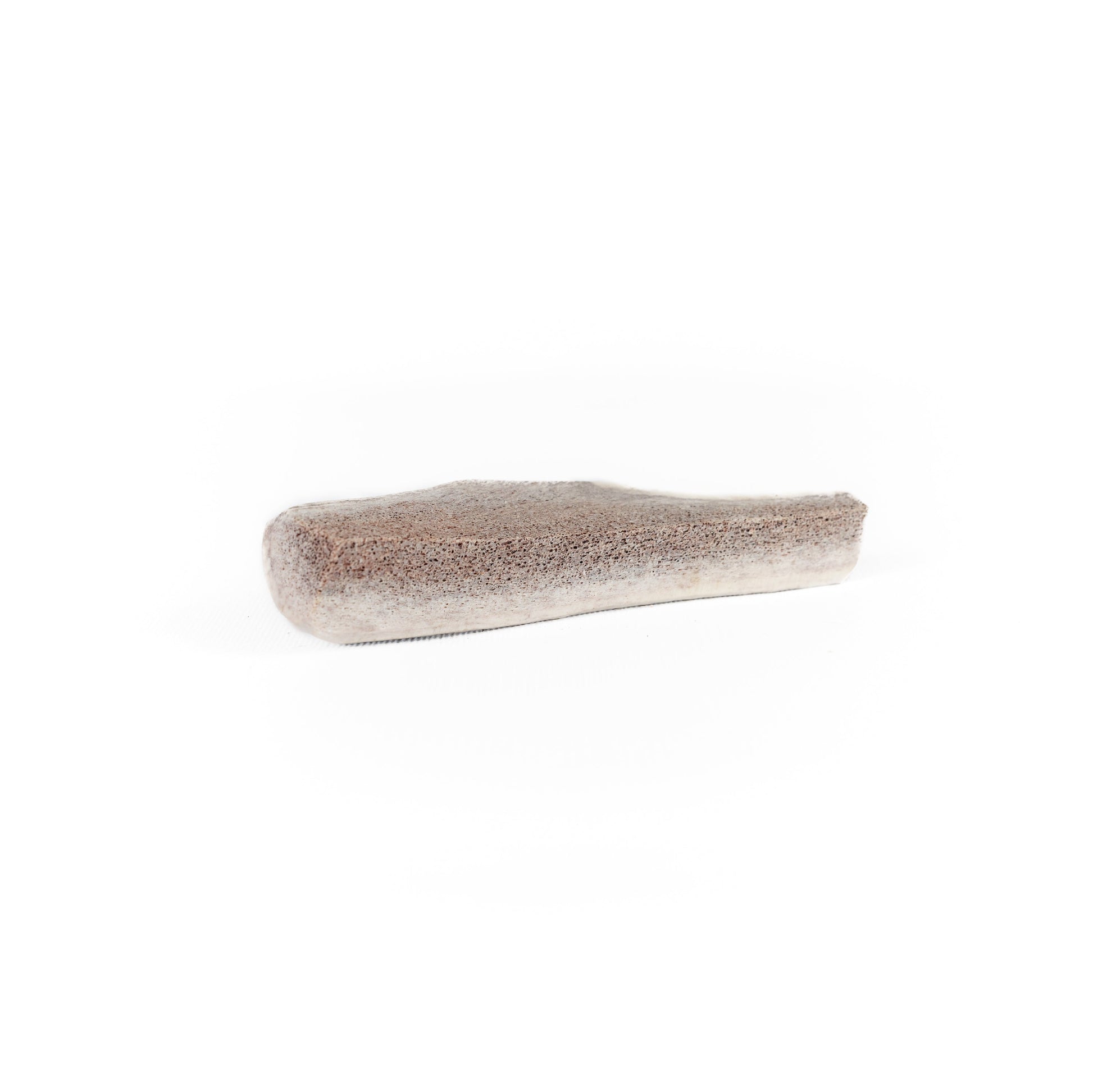 a medium quarter split elk antler chew on a white background