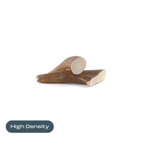 two small moose tine antler chews on a white background with the text "High Density" at the bottom 