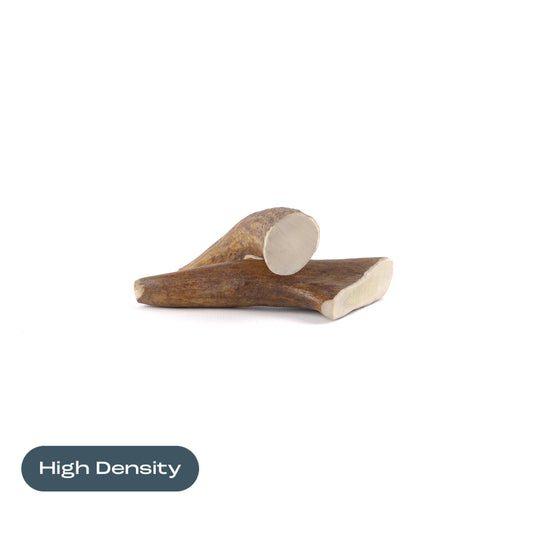 two small moose tine antler chews on a white background with the text "High Density" at the bottom 